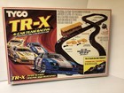 TYCO SET HO TR-X 4-CAR TEAM RACING SET 2 Powered/2 Blocking Cars 6222/NEW/SEALED — photo 1