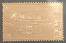Timbre de La Dominique en OR 23 carats, thème : Avion, 16$