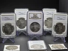 A Mixed Lot Of 8 Morgan Silver Dollars