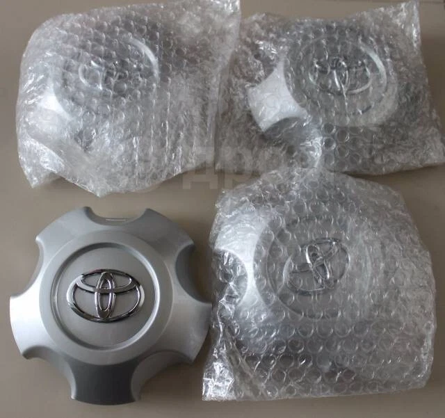 Tapacubos central de rueda Toyota genuino 4260B-60030 para Land Cruiser LC200 4 piezas. NUEVO Foto 2 de 3