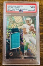 2020 Panini Spectra - Next Era Relics - Neon Blue Tua Tagovailoa /199 (MEM, RC)