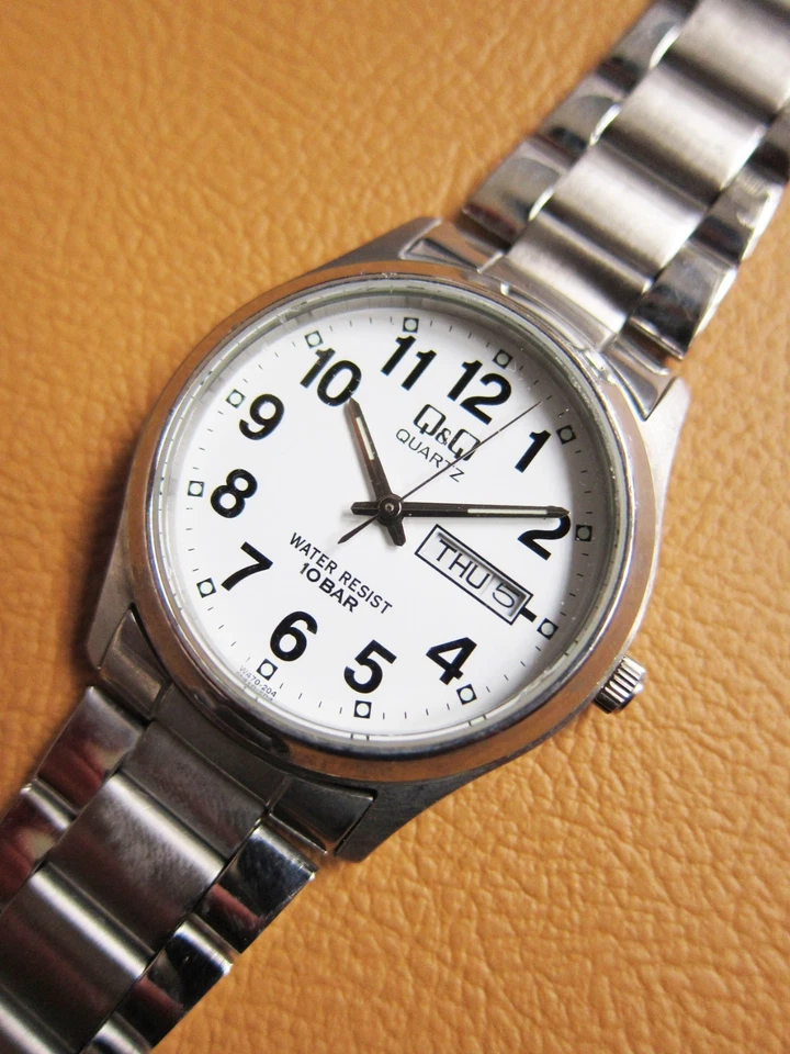 Q&Q (Citizen) 2105 S.S Reloj de Cuarzo con Esfera Blanca Foto 2 de 4