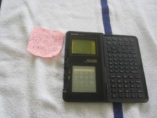 Sharp OZ-7000 Electronic Organizer Wizard W/BATTERIES SCREEN ISSU NoManual WORKS