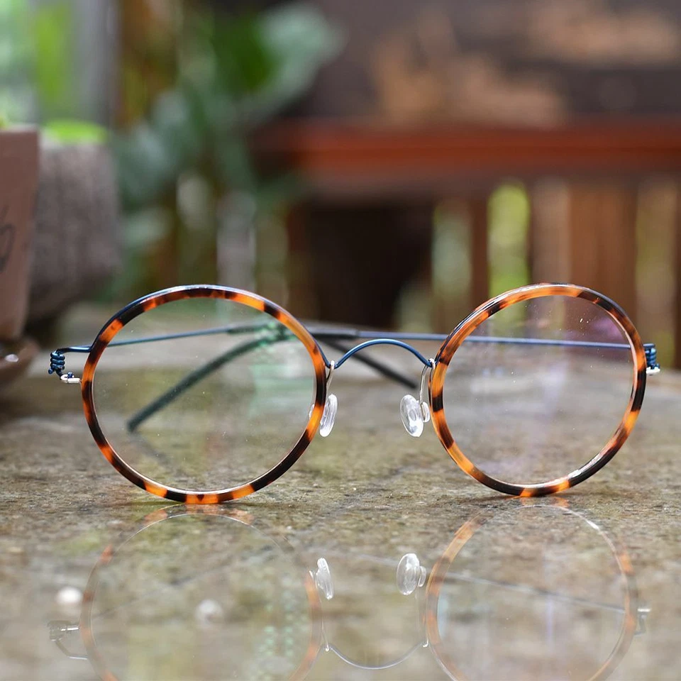 Gafas redondas para hombre Tortuga marco redondo azul aleación de titanio piernas gafas para mujer Foto 4 de 4