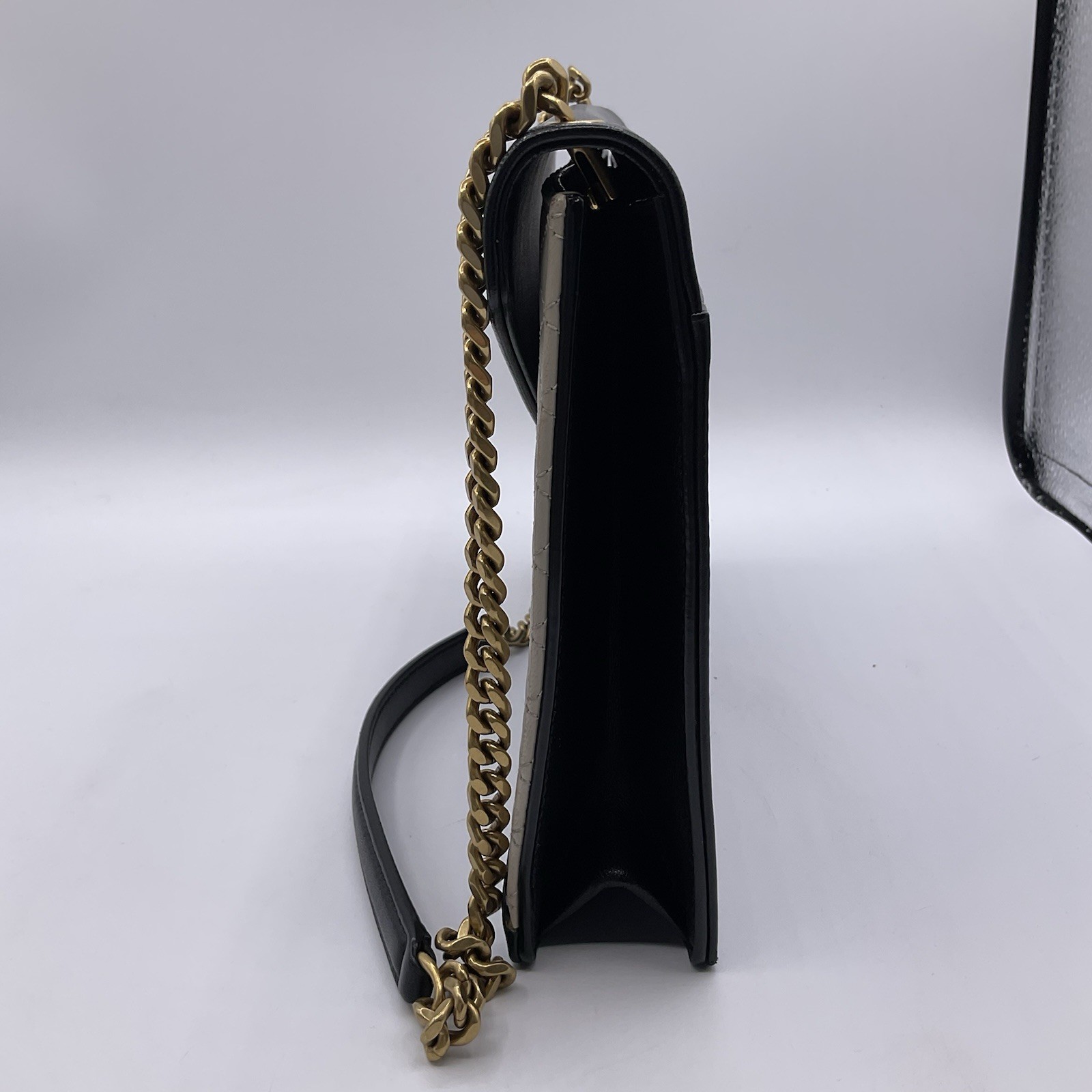 Borsa a tracolla YSL Saint Laurent Gaby busta catena pelle trapuntata nero crema