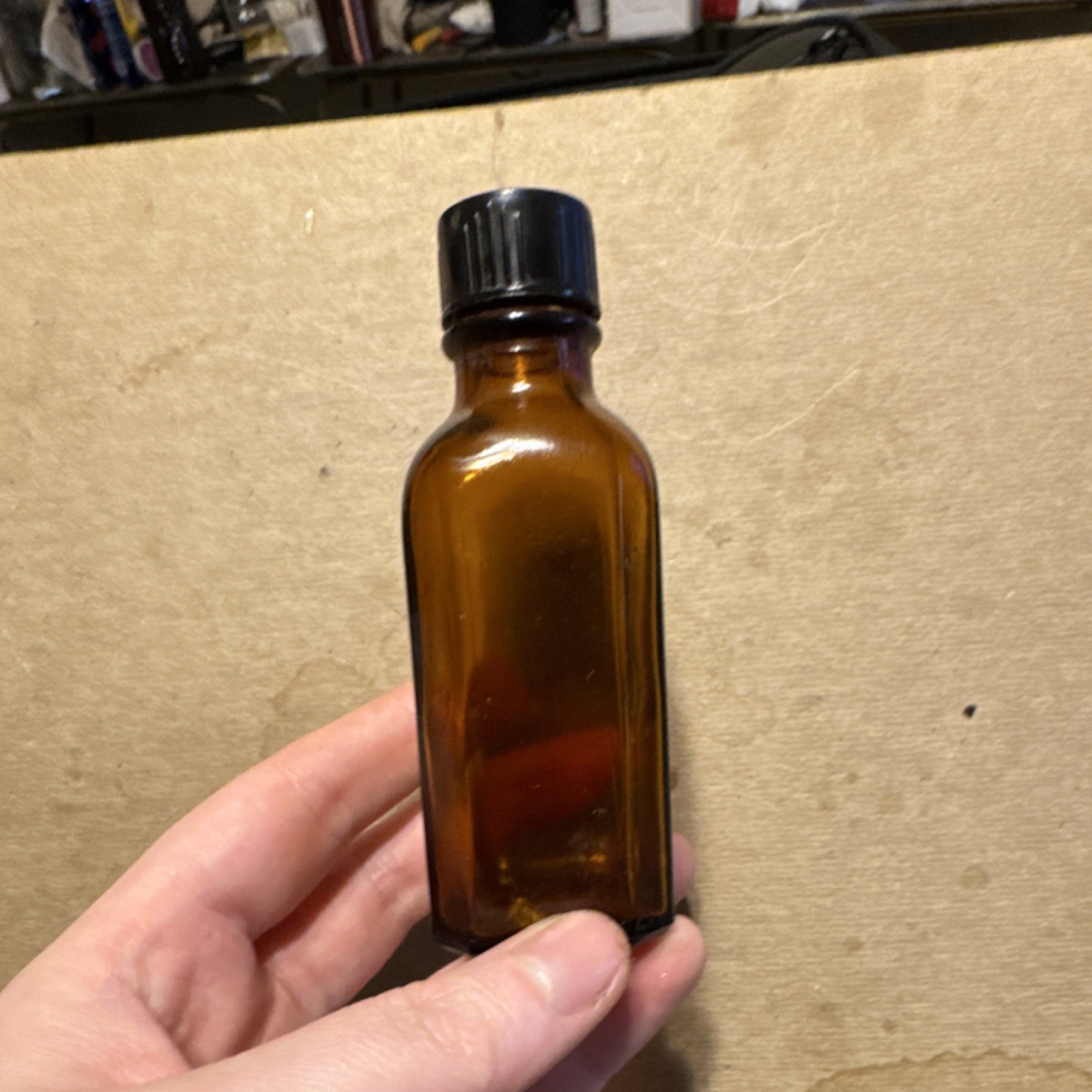 Amber Brown Glass Medicine Bottle 2 oz Screw Cap Marked A65 USA with Black Cap