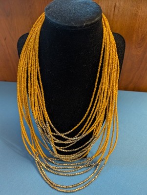 Vtg custome necklace, 18 strands, dark yellow beads w/shiny gold beads, 18''-22''