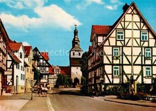 Helsa Berliner Strasse mit Kirche und Buerger...
