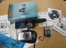 Canon Ixus 970 IS Digital Camera Bundle Read Description 