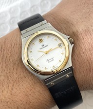 Unisex Quartz Timonier Tone Watch Tow dial 31mm Vintage Pryngeps Made Swiss rare - vintagewatches.pk