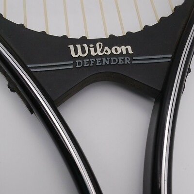 Raquette de tennis Wilson Defender graphite 4 1/2 L2 avec enveloppe