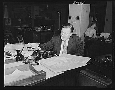 Photo:Office Worker at Desk 1935-1945 Papers Typewriter Black and White