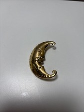 Gold-tone metal crescent moon face brooch