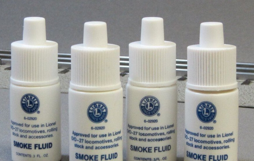 FOUR BOTTLES OF LIONEL SMOKE FLUID train steam engine diesel drops (4) 6-02920