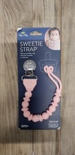 Itzy Ritzy Silicone Pacifier Clip In color Blush