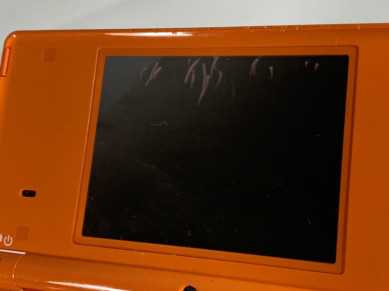 Nintendo DSi Orange handheld system Console