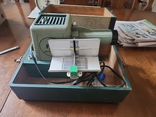 Vintage BRUMBERGER #1316 -35mm Photo Slide Projector in Case - turns on untested