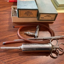 2 IDEAL DEALS here.1 Dose Syringe 2 OZ.  1 Automatic Syringe Filler. Not al Here