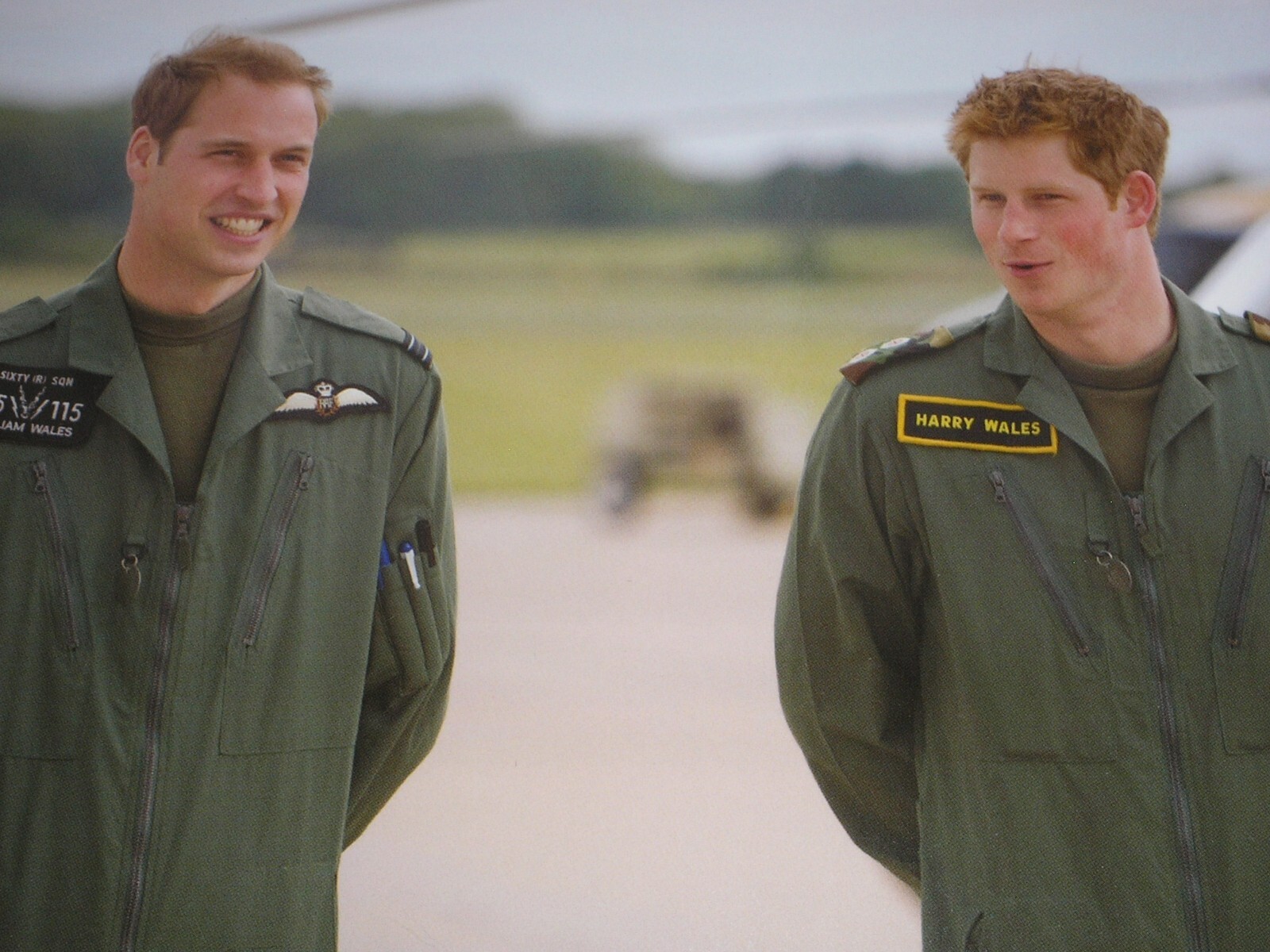 PRINCE WILLIAM & PRINCE HARRY IN MILITARY COVERALLS COLOUR POSTCARD