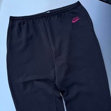 Vintage early 90s made in USA Black Nike sweatpants with pink embroidered logo