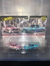 Hot Wheels 2 Pack 1975 Datsun Sunny Truck B120 Custom 93 Nissan Hardbody D21