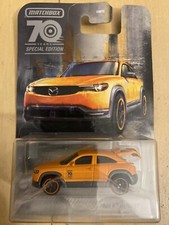 2023 MATCHBOX Moving Parts ‘21 Mazda MX30 (Orange 70 Years Special Edition) E99