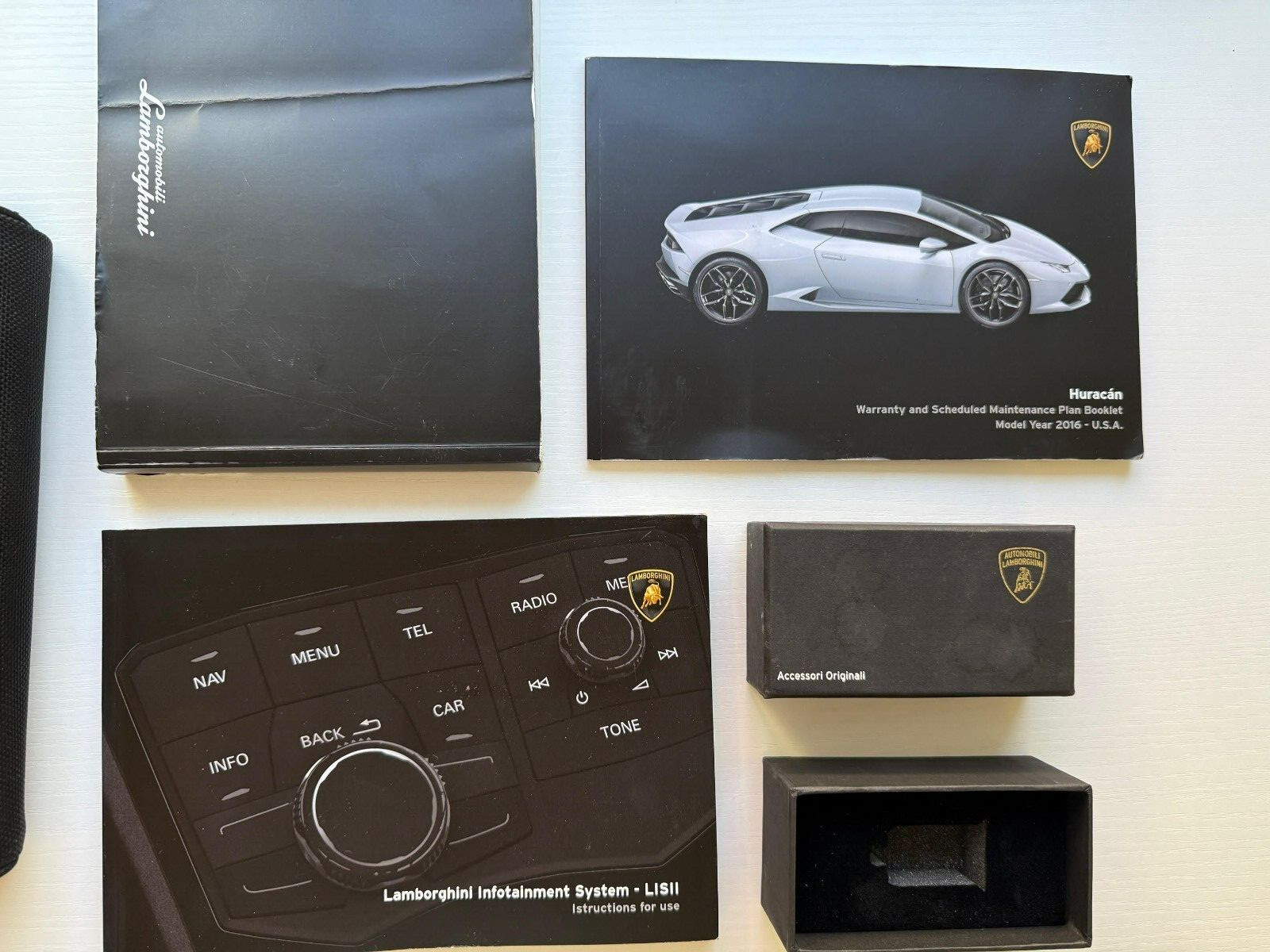 Lamborghini Huracan, full Owners Manuals, w/ Case and extra charging box