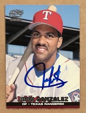 JUAN GONZALEZ AUTOGRAPHED 2000 PACIFIC BASEBALL CARD # 420 TEXAS RANGERS