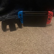 Nintendo Switch (NO WIRES) Handheld Console 32GB Neon Blue/Red with 128GB Memory