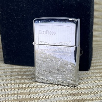 zippo vintage Marlboro lighter - three cowboys on horseback, rare