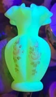 Fenton hand-painted  custard uranium glass vase.  Signed V. Hendricks