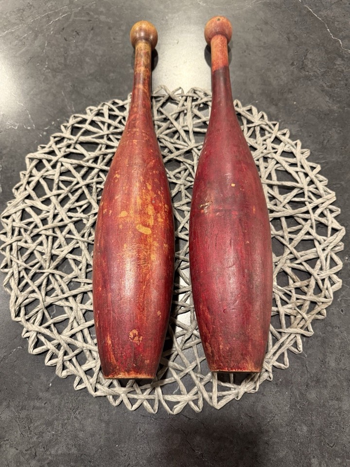 A pair of antique wooden Indian clubs used for exercise and juggling ...