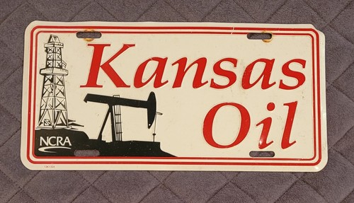 Kansas Oil Booster License Plate National Cooperative Refinery Association Man