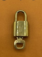 Louis Vuitton Lock and Key 319 Gold Tone Cadena