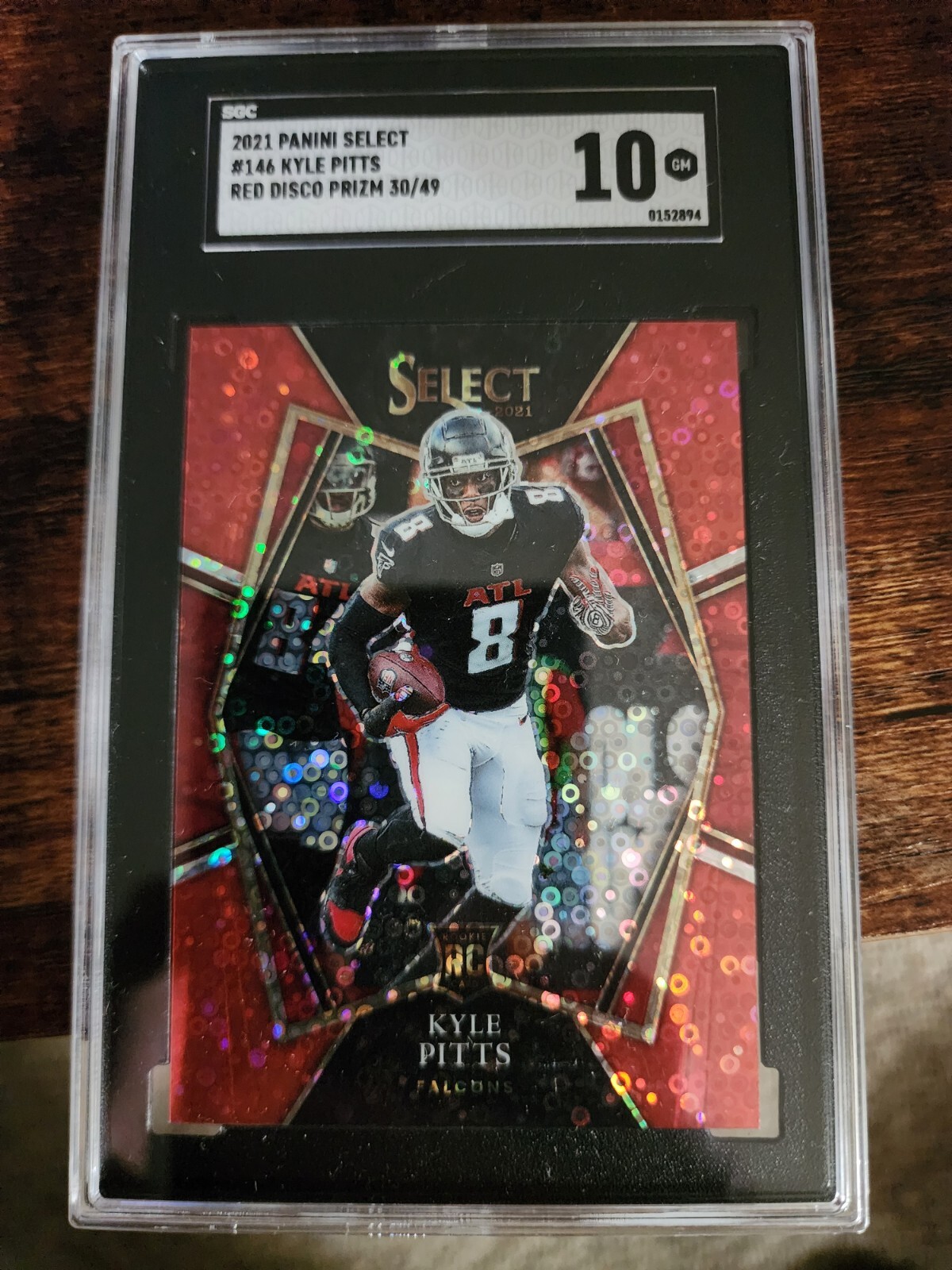2021 Panini Select - Premier Level Red Disco Prizm #146 Kyle Pitts /49 (RC)