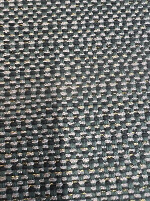 Fabric In Teal With A Gold Thread Going Through It