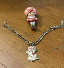Strawberry Shortcake Bundle; 1980  s bracelet and figure- broken clasp