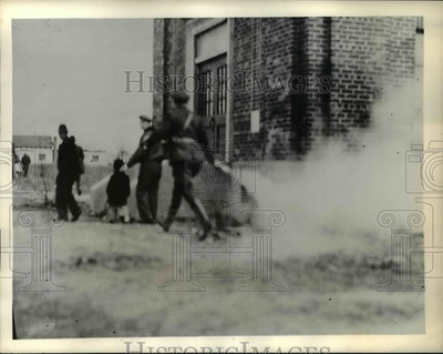 #ad 1934 Press Photo Police Use Tear Gas at Curtiss Airplane amp; Motor Company Strike $23.88