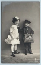 Postcard Studio Real Photo RPPC Girl Maid Boy Uniformed Messenger c1912 AG10