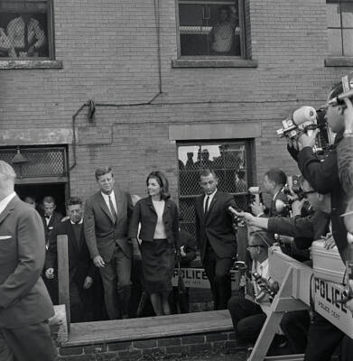 President John F Kennedy escorts first lady out Joy Street Poli- 1962 Old Photo