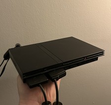 Sony PlayStation 2 Slim, 2 controllers, 26 Games