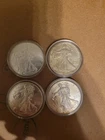 Lot of 4 Silver mixed years American Eagle 1 oz. Fine .999 US oz Coins