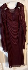 Burgundy Formal Evening Gown with Sheer Sleeves and Shoulder Embellishments