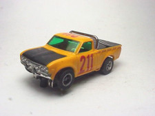 AURORA AFX DATSUN BAJA PICK UP TRUCK  211 W/ MAGNATRACTION CHASSIS. RUNS WELL