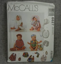 McCalls 6627 Infants Bib Hat Diaper Bottle and Diaper Covers Small-XL Uncut