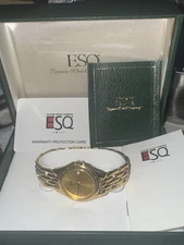 NOS ESQ Swiss By Movado Unisex Gold Tone Quartz Date Watch 07300323 Box/Papers