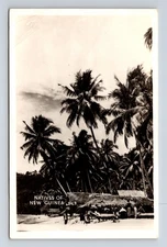 Grogan Photo RPPC Beach View Grass Huts New Guinea Real Photo Postcard