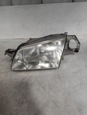 Feu avant (phare) Mazda 323