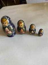 Russian Nesting Dolls . Doll Face w/ Flowers. 4pc. Initials on Bottom.  G-17