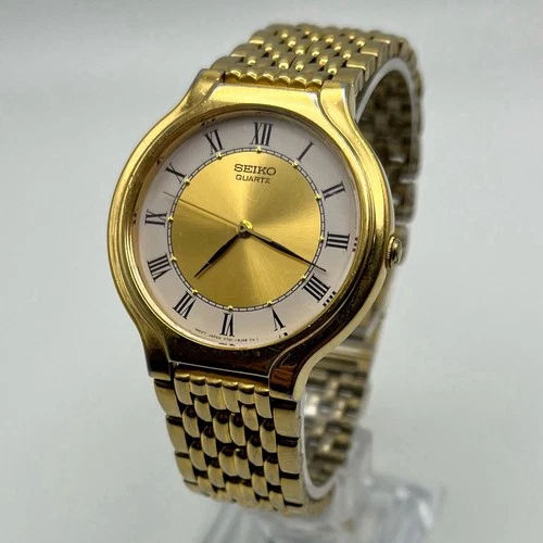Seiko Quartz V701-6K69 R0 34mm Gold Tone Sunburst Dial Beads of Rice VTG